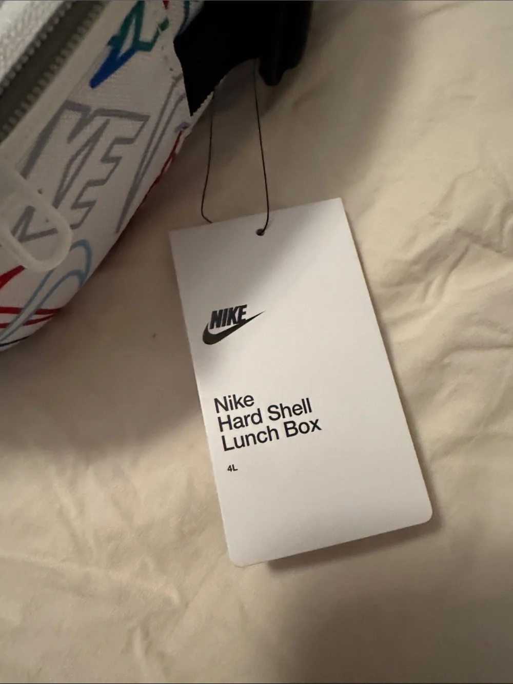 Nike White Hard Shell Lunch Box with Red, Blue and Green Logo Print